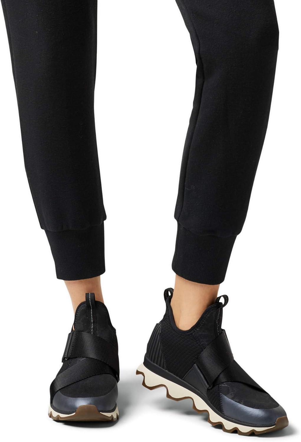 imageSOREL Womens Kinetic Sneak Knit Sneaker with Scalloped Sole and Stretch StrapsBlack White